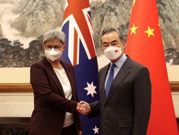 Australian Foreign Minister Penny Wong poses for a photo with her Chinese counterpart Wang Yi in Beijing, China, 21 December 2022. (Photo: Reuters/Sarah Friend)