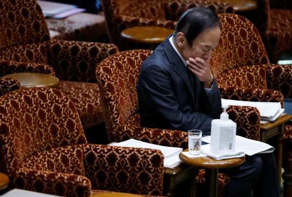 The Japanese government's nominee for the Bank of Japan (BOJ) Governor Kazuo Ueda attends a hearing session at the upper house of the parliament in Tokyo, Japan, 27 February 2023 (Photo: Reuters/Issei Kato).
