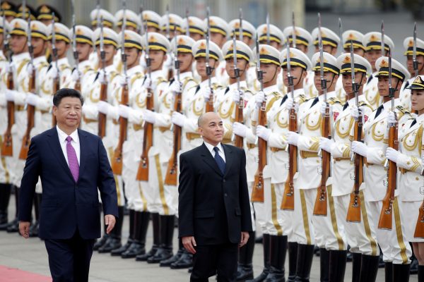 China's President Xi Jinping and Cambodian King Norodom Sihamoni review honour guards during a welcoming ceremony outside the Great Hall of the People, Beijing, China, 3 June, 2016 (Photo: Reuters/Jason Lee).