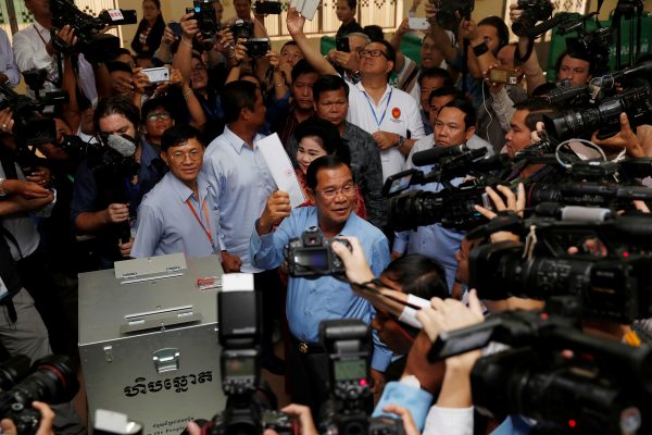 Cambodia's Prime Minister and President of the Cambodian People's Party Hun Sen prepares to cast his vote at a polling station during a general election in Takhmao, Cambodia, 29 July, 2018 (Photo: Reuters/Darren Whiteside).