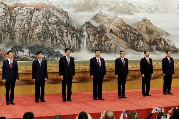 China's new Politburo Standing Committee members line up as they meet the press at the Great Hall of the People in Beijing, China 25 October 2017. (Photo: Reuters/Jason Lee)