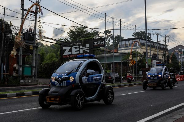 Electric vehicles police cars patrol for the G20 Summit in Nusa Dua, Bali, Indonesia, 13 November 2022 (Photo: Reuters/Garry Lotulung).