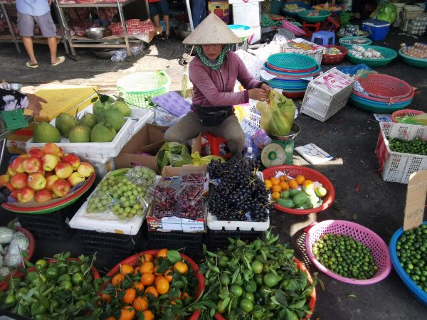 Fruits and vegetables are for sale at a market in Ho Chi Minh City, 18 April 2023. (Photo: Reuters/Alexandra Schuler/dpa via Reuters Connect)