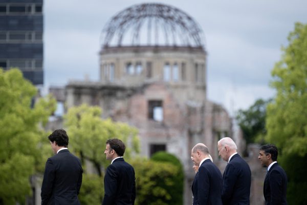 Canada's Prime Minister Justin Trudeau, France's President Emmanuel Macron, Germany's Chancellor Olaf Scholz, European Commission President Ursula von der Leyen, US President Joe Biden and Britain's Prime Minister Rishi Sunak walk before the Atomic Bomb Dome during a visit to the Peace Memorial Park as part of the G7 Leaders' Summit in Hiroshima on 19 May 2023. (Photo: Reuters/Brendan Smialowksi)