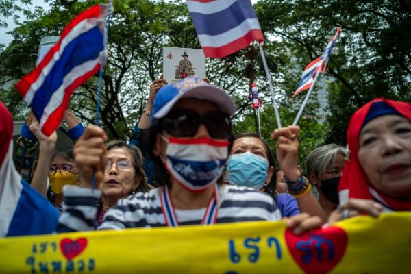 Pro-royalist activists shout slogans during a rally calling the US not to interfere in Thailand's election process, in front of the US embassy in Bangkok, Thailand, 24 May 2023 (Photo: REUTERS/Athit Perawongmetha).