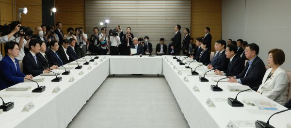 Japanese Prime Minister Fumio Kishida attends a ministerial meeting on the acceptance and coexistence of foreign workers at the prime minister's office in Tokyo, Japan on 23 May 2023 (Photo: The Yomiuri Shimbun via Reuters).