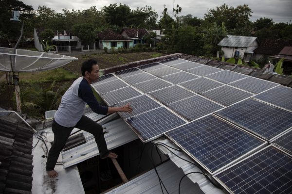 Awab Abdullah (49), an initiator of energy transformation, shows an solar powered electrical installation in his house, at Gunung Kidul regency, Yogyakarta Special province, Indonesia, 29 October 2022 (Photo: Reuters/Aditya Irawan/NurPhoto).