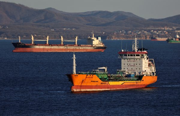 The crude oil tanker RN Polaris and a bulk carrier sail in Nakhodka Bay near the port city of Nakhodka, Russia, 4 December 2022 (Photo: Reuters/Tatiana Meel).