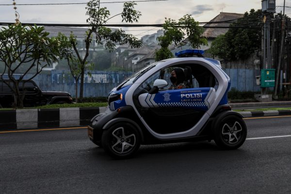 Electric vehicle police cars patrol for the G20 Summit in Nusa Dua, Bali, Indonesia, 13 November 2022 (Photo: Garry Lotulung/NurPhoto via Reuters).