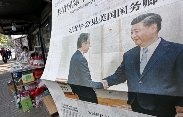 A Chinese newspaper reporting on meeting between US Secretary of State Antony John Blinken and Chinese President Xi Jinping in Beijing, China on 20 June 2023 (Photo: Reuters/Yomiuri Shimbun).