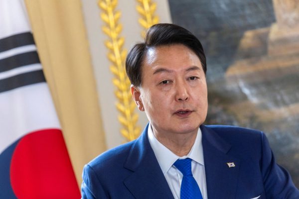 South Korean President Yoon Suk-yeol speaks during a joint press conference with French President Emmanuel Macron at Elysee Palace in Paris, France, 20 June 2023 (Photo: Christophe Petit Tesson/Reuters).
