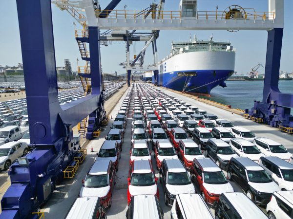 Commercial vehicles being readied for export via ro-ro ships at Yantai Port in Yantai, Shandong province, China, 5 July 2023 (Photo: Costfoto/NurPhoto via Reuters).