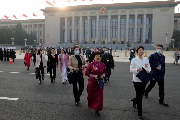 Women delegates leave the Great Hall of the People following the opening session of the Chinese People's Political Consultative Conference in Beijing, China, 4 March 2023 (Photo: Reuters/Thomas Peter).