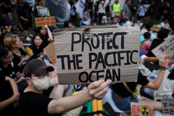 South Korean activists protest against Japan's plan to release treated wastewater from the Fukushima nuclear power plant into the ocean, in central Seoul, South Korea, 12 August 2023 (Photo: REUTERS/Kim Hong-Ji)