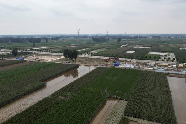 An aerial view shows flood-affected farmlands after the rains and floods brought by remnants of Typhoon Doksuri, in Zhuozhou, Hebei province, China, 7 August 2023 (Photo: Reuters/Josh Arslan)