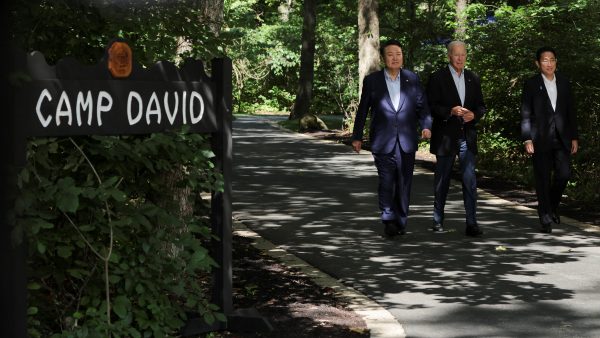 US President Joe Biden, Japanese Prime Minister Fumio Kishida and South Korean President Yoon Suk Yeol arrive for a joint press conference during the trilateral summit at Camp David near Thurmont, Maryland, US, 18 August 2023 (Photo: Reuters/Jim Bourg).