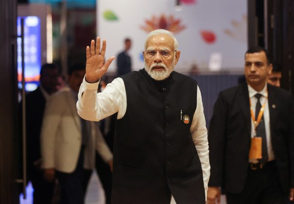 Indian Prime Minister Narendra Modi waves as he visits International Media Center, on the second day of the G20 summit in New Delhi, India, 10 September 2023. (Photo: Reuters/Francis Mascarenhas).