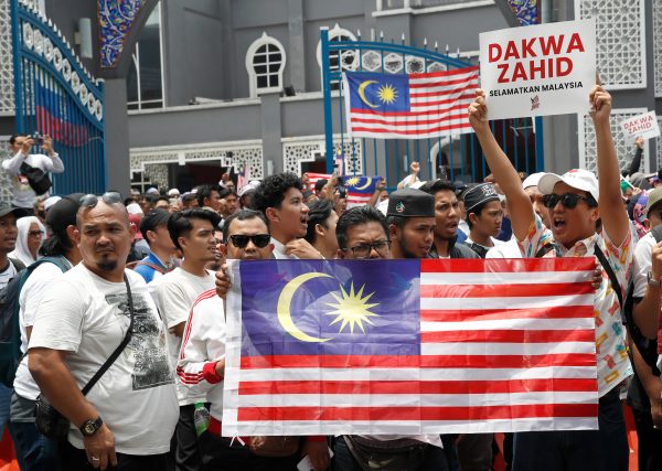 Protesters holding Malaysia flags and placards attending the ‘Save Malaysia’ rally in Kuala Lumpur, Malaysia, 16 September 2023 (Photo: Reuters/EyePress Newswire/FL Wong).