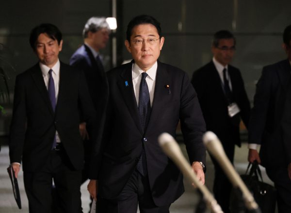 Japanese Prime Minister Fumio Kishida announces his intention to reduce income tax in Tokyo, 23 May 2023 (Masanori Genko/The Yomiuri Shimbun via Reuters).