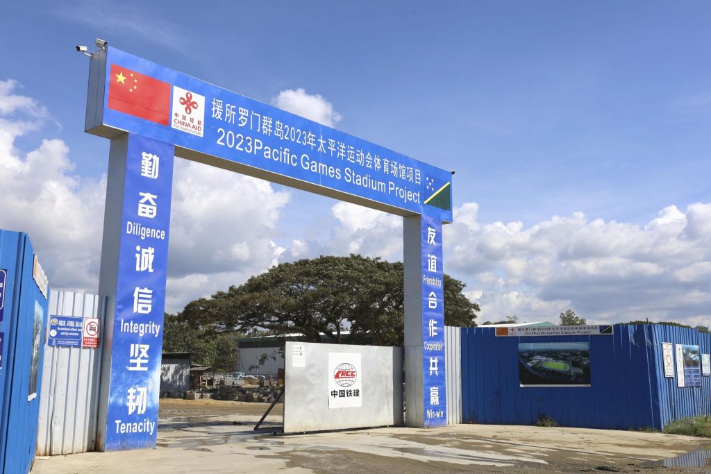 Photo taken in Honiara, the capital of the Solomon Islands, on 21 July 2022, shows China's national flag displayed on a gate of a stadium construction site. China is building the stadium for the 2023 Pacific Games (Photo: Reuters/Kyodo).