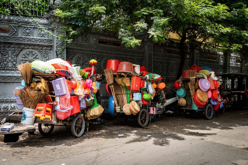 Carts for selling brooms and other household cleaning goods are seen parked in Phnom Penh. (Photo Reuters/Matt Hunt).
