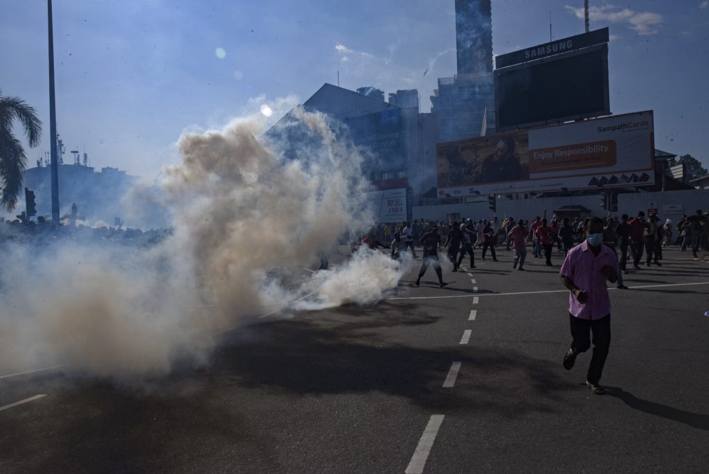 Riot police use tear gas and water cannon to disperse the National People's Power rally taking part in Colombo, Sri Lanka, 26 February 2023 (Photo: Akila Jayawardana/NurPhoto via Reuters).