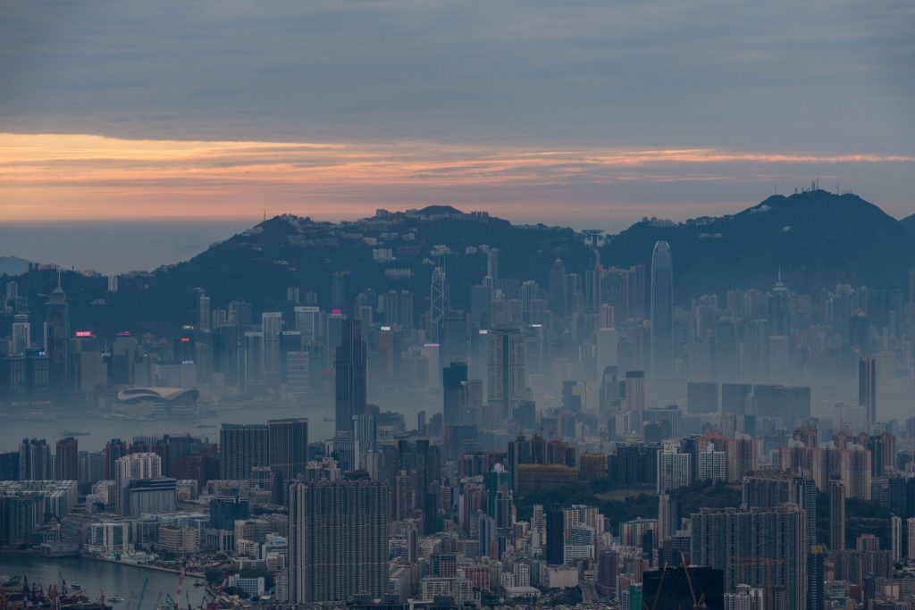 Mist rises over Victoria Harbour, in Kowloon, Hong Kong, 31 December 2023 (Photo: Marc Fernandes/NurPhoto via Reuters).