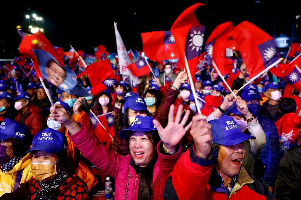 Supporters of Hou Yu-ih, a candidate for Taiwan's presidency from the main opposition party Kuomintang (KMT) attend a campaign event in Keelung, Taiwan, 4 January 2024 (Photo: Reuters/Ann Wang).