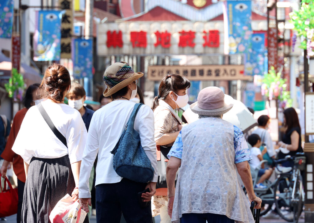 Elderly people stroll at Jizodori shopping street at Tokyo's Sugamo district on 20 September 2021 on the Respect for the Aged Day (Photo: Reuters/Yoshio Tsunoda/AFLO).