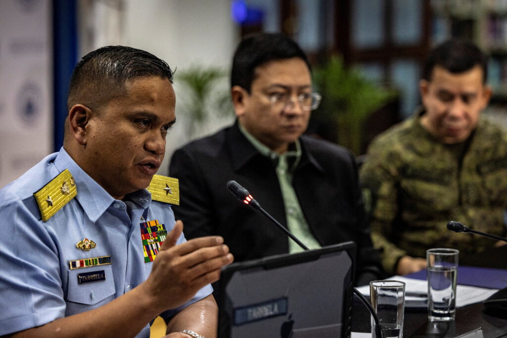 Philippine Coast Guard spokesperson for the West Philippine Sea Commodore Jay Tarriela, National Security Council spokesperson Jonathan Malaya and Armed Forces of the Philippines spokesperson Colonel Medel Aguilar speak to the press during a news conference in response to recent aggression of the Chinese Coast Guard against Philippine vessels in the South China Sea, at the Department of Foreign Affairs in Manila, Philippines, 7 August 2023 (Photo: Ezra Acayan/Pool via Reuters).
