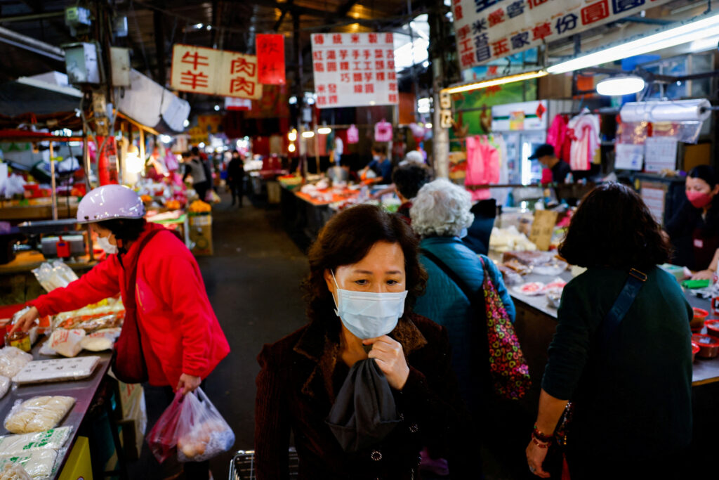 People buy food items at a market in New Taipei City, Taiwan, 31 January 2024 (Photo: Reuters/Ann Wang).