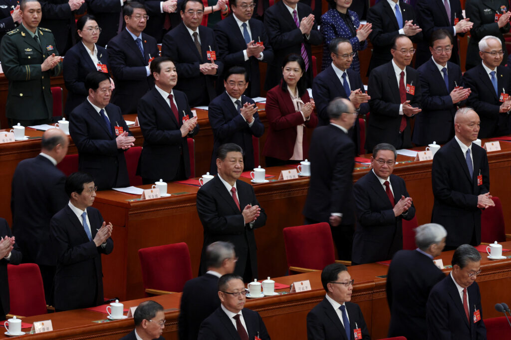 Chinese President Xi Jinping and other leaders attend the closing session of the National People's Congress (NPC) at the Great Hall of the People in Beijing, China, 11 March 2024 (Photo: Reuters/Florence Lo).