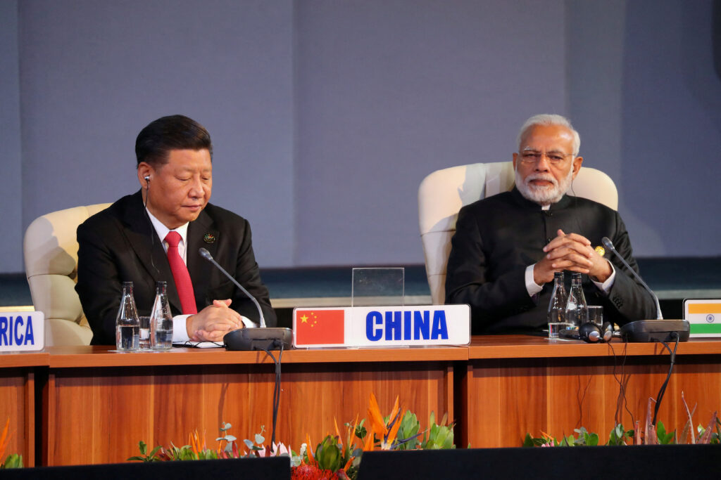 Indian Prime Minister Narendra Modi and China's President Xi Jinping attend the BRICS summit meeting in Johannesburg, South Africa, 27 July 2018 (Photo: REUTERS/Mike Hutchings).