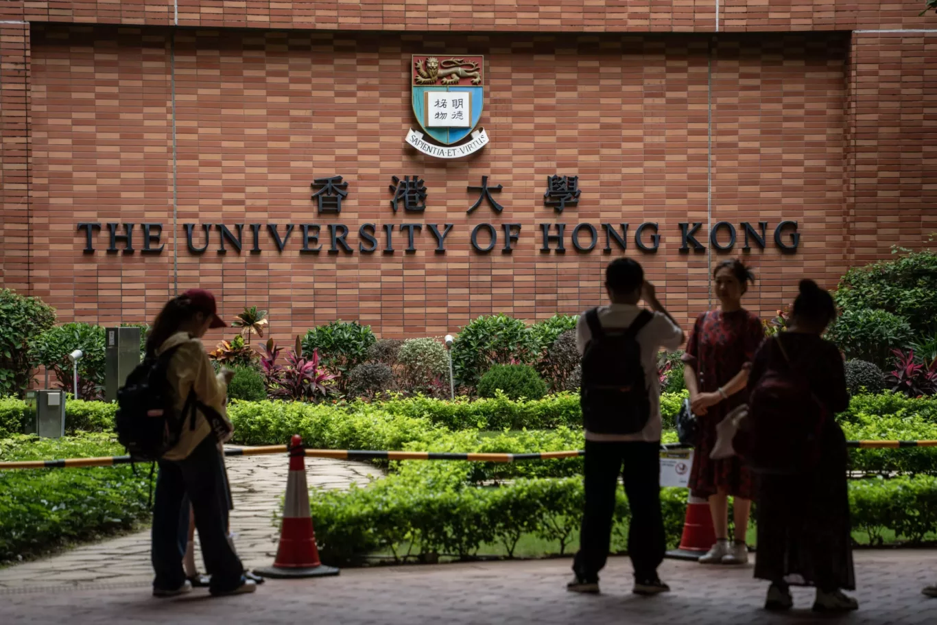 People are taking pictures with the HKU sign at the University of Hong Kong in Hong Kong 30 April 2024. (Photo: Reuters/Vernon Yuen/NurPhoto).