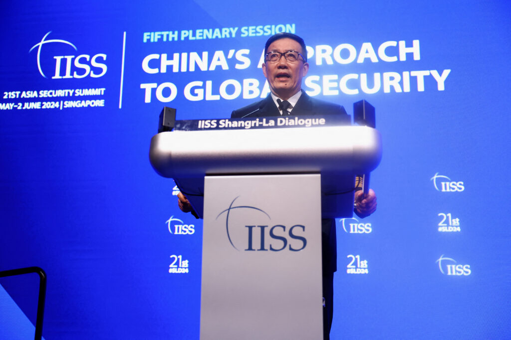 Chinese Defense Minister Dong Jun speaks at the Shangri-la Dialogue in Singapore, 2 June 2024 (Photo: Reuters/Edgar Su).