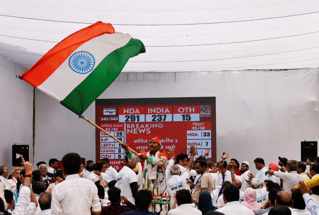 Indian National Congress (INC) supporters react to initial general election results at the party headquarters, in New Delhi, India, 4 June 2024 (Photo: Reuters/Anushree Fadnavis).